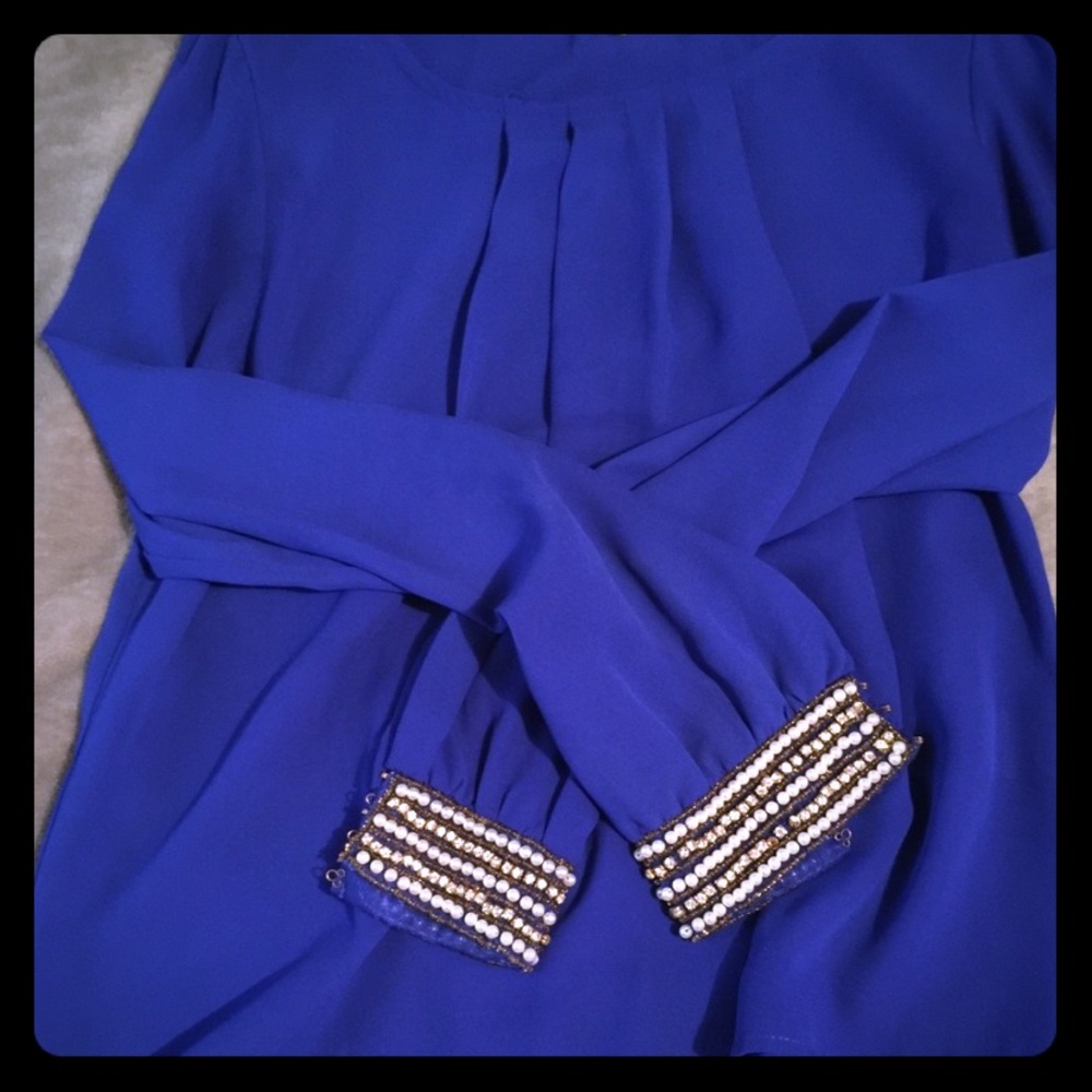 Beautiful blue blouse with embellishments